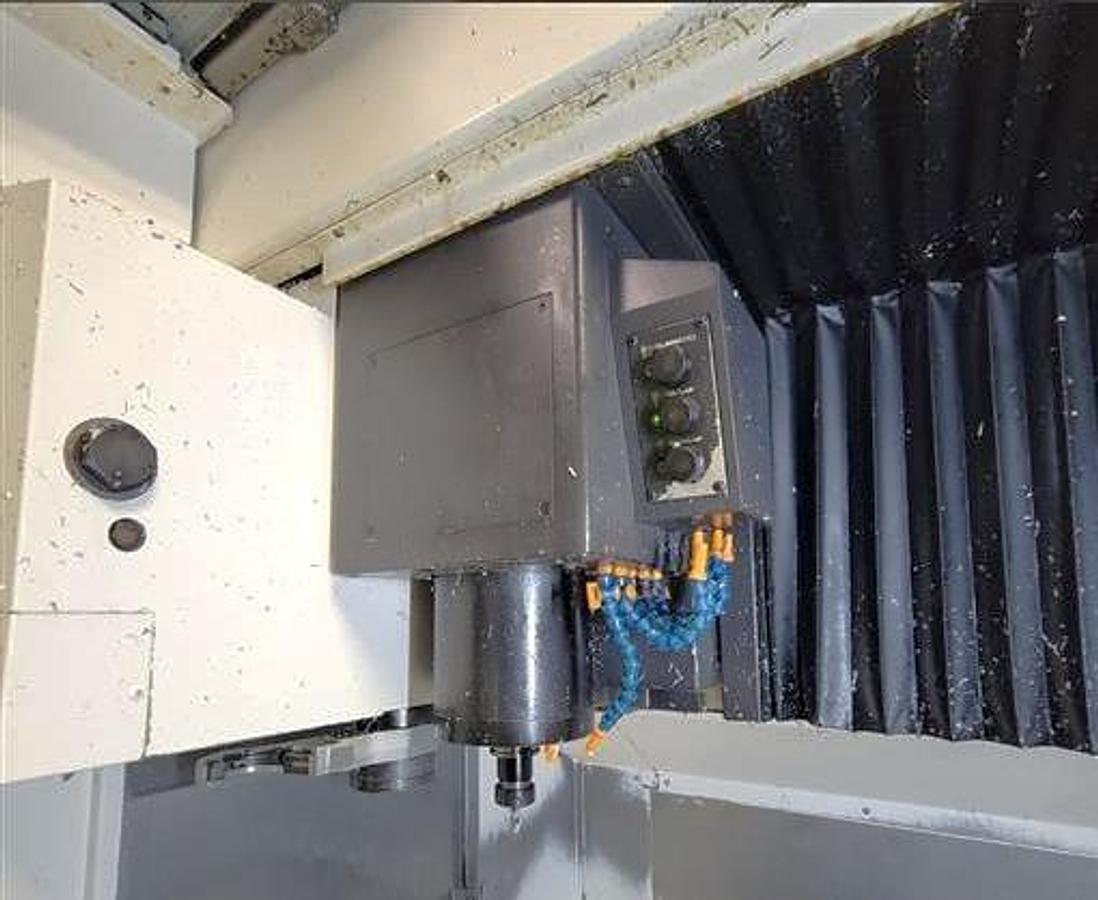 Used 2015 Okuma M560-V with 4th Axis Rotary Table, Renishaw Tool & Part Probing, 15k RPM, 32 Pos. ATC, Chip Claster HPC