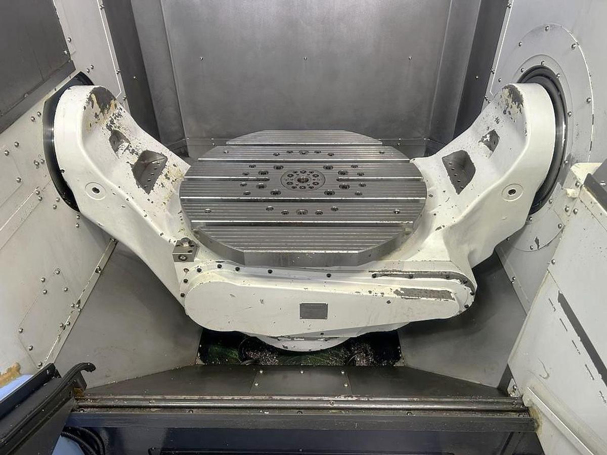 Used 2022 DN Solutions DVF 6500 5 Axis Trunnion VMC with 18,000 RPM, 60 ATC, Coolant Thru Spindle, Probing, Chip Conveyor
