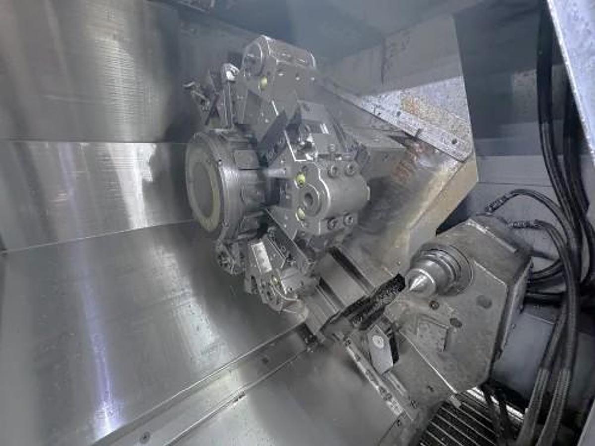 Used 2004 Mori Seiki SL-204MC with C Axis Rotation, Mill/Drilling Capability, Tailstock, Collet Chuck, Chip Conveyor, 2" Bar Capacity