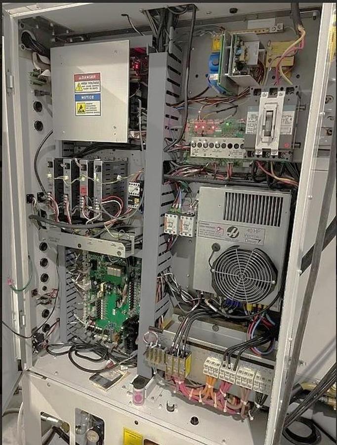 Used 2006 Haas VM-2 with Haas HRT210 4th Axis Table, Prog. Coolant, Remote Jog Handle, 24 Station Side Mount ATC, High Spd Machining