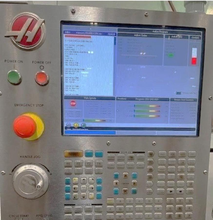 Used 2017 Haas VF4 with Haas Probing, Chip Auger, 20 Station Umbrella ATC, 8100 RPM