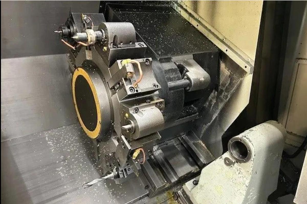 Used 2007 Mori Seiki NL2500MC/700 with 3" Bar Cap., Chip Conveyor, Tailstock, Tool Presetter, Bar Feeder, Parts Exit Conveyor