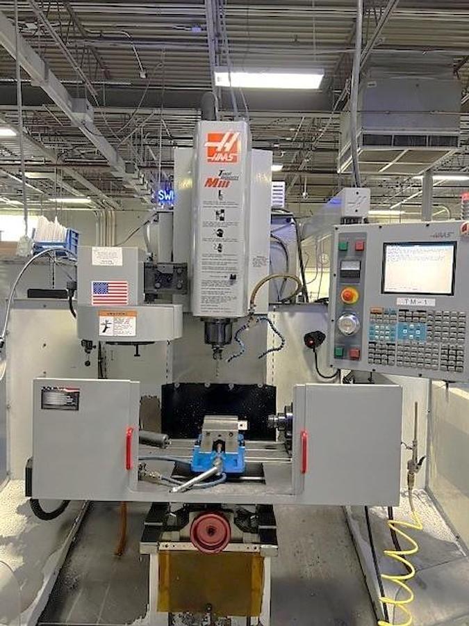 Used 2004 Haas TM-1 with Haas HA-5C Indexer, Tool Probing, 10 Station ATC, Single or Three Phase Power Capable, Splash Guarding