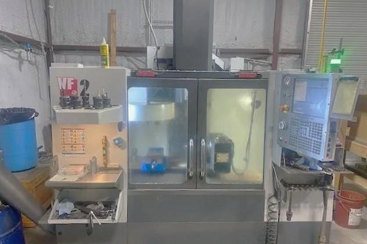 Used 2013 Haas VF2 with Haas/Renishaw Probing, 4th Axis Drive & Wiring, Prepped for Coolant Thru Spindle, Chip Auger