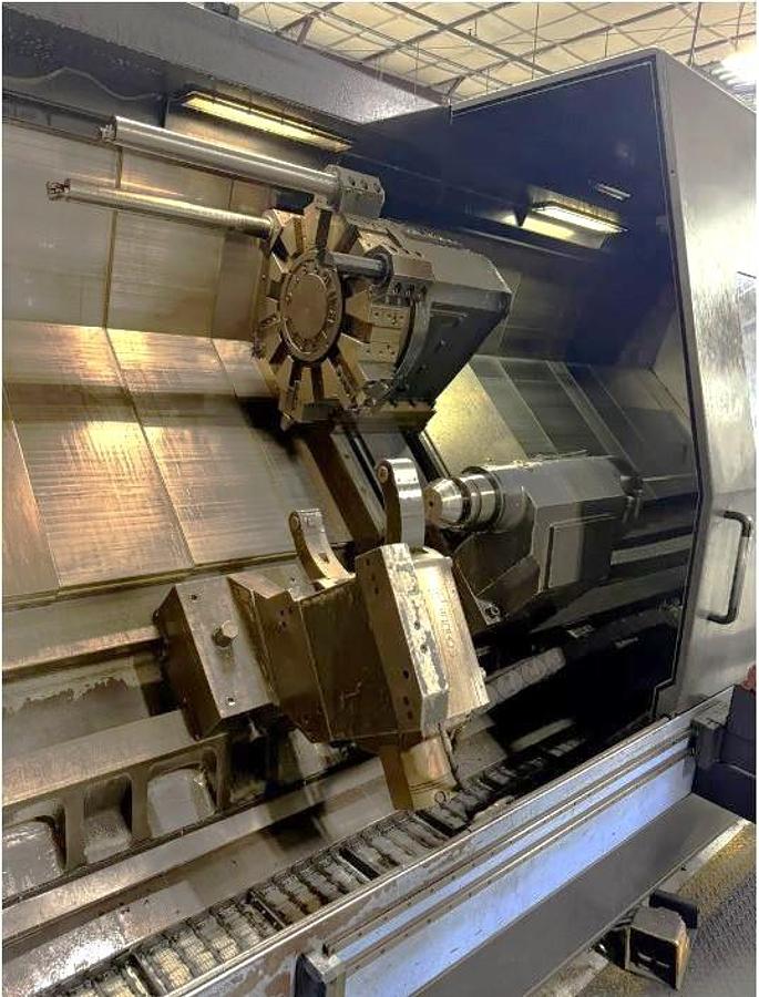 Used 2012 Doosan Puma 800L with, 24" 4 Jaw Man. Chk, 12.6" Bar Cap., 35.4" x 126" Capacity, Steady Rest, Tailstock, Conveyor
