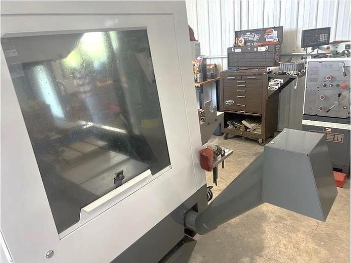 Used 2015 Haas VF2 with 24 Station Side Mount ATC, Probing, 4th Axis Drive/Wiring, Haas 4th Axis Rotary Table, PCool, Chip Auger