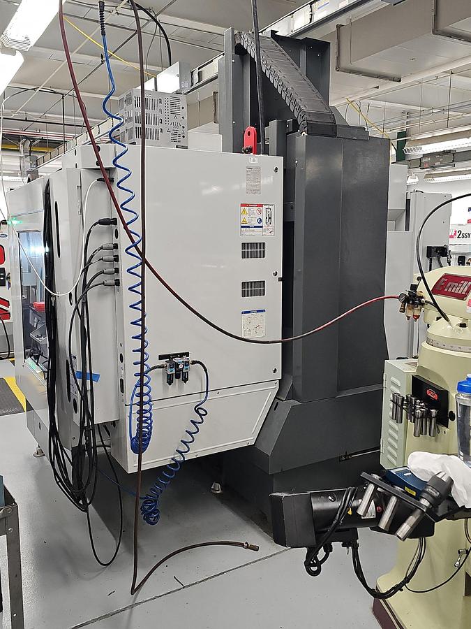 Used 2013 Haas VF-4SS w/Wired for 4th/5th axis, Remote Jog Handle, WIPS Renishaw Tool & Part Probe, Programmable Coolant Nozzle