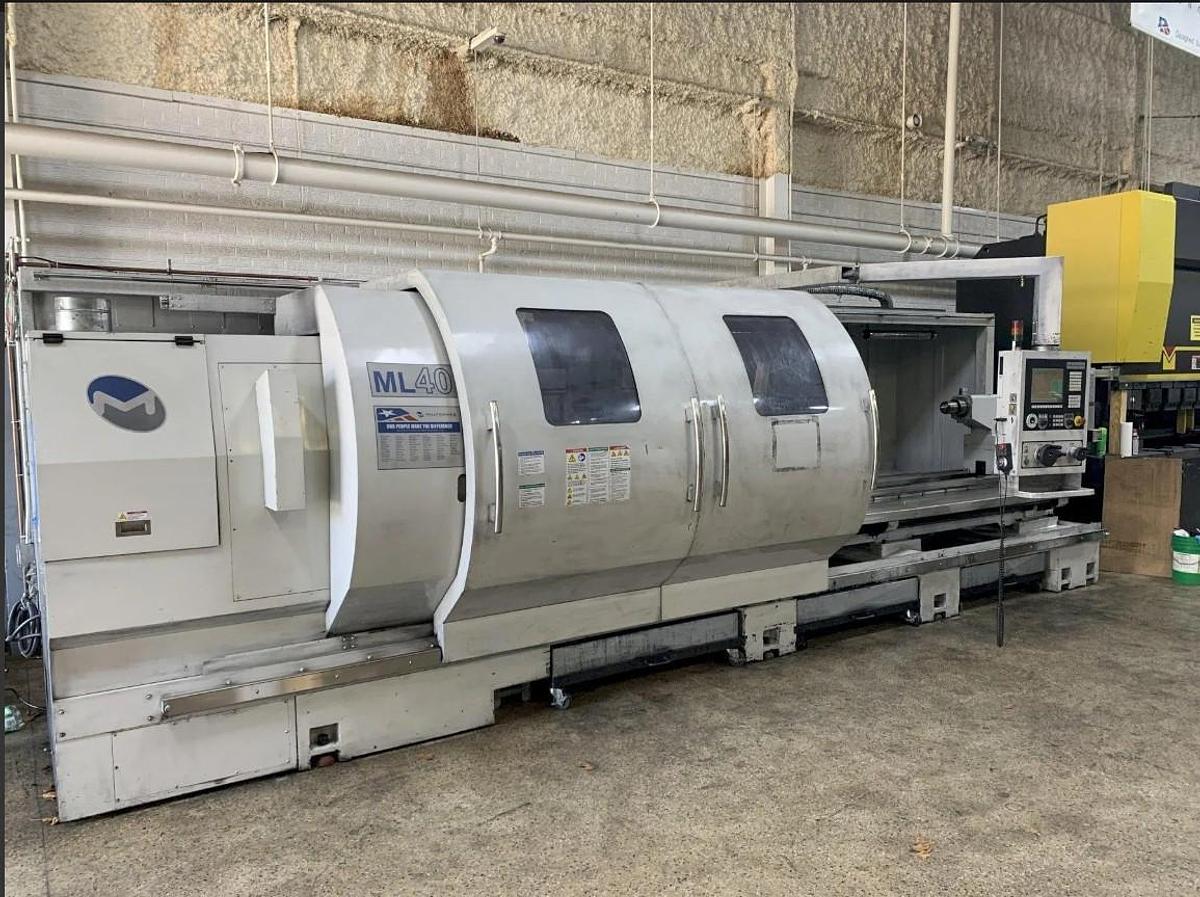 Used 2010 Milltronics ML40/160 with 14" Big Bore Spindle, 31.5" 3 Jaw Manual Chuck, Tailstock, 12 Station Turret, (2) Steady Rests