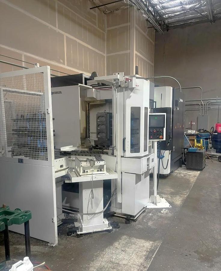 Used 2020 Okuma MB-4000H with 6 Pallet Changer, Full 4th Axis, Renishaw Probing, High Press. Coolant Thru Spindle, 146 Pos. ATC, Conveyor