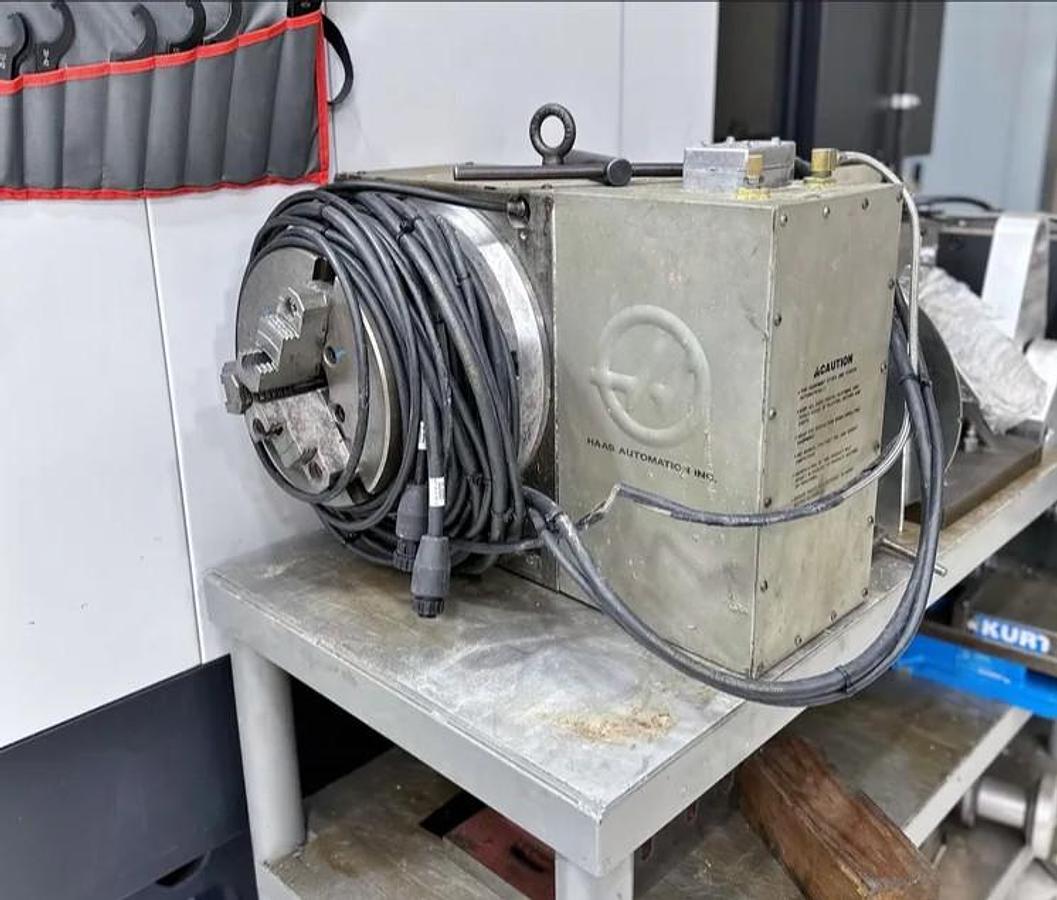 Used 2011 Haas VF5/40 w/ Haas HRT310 Rotary Table, 10,000 RPM, PCool, HSM, Auger