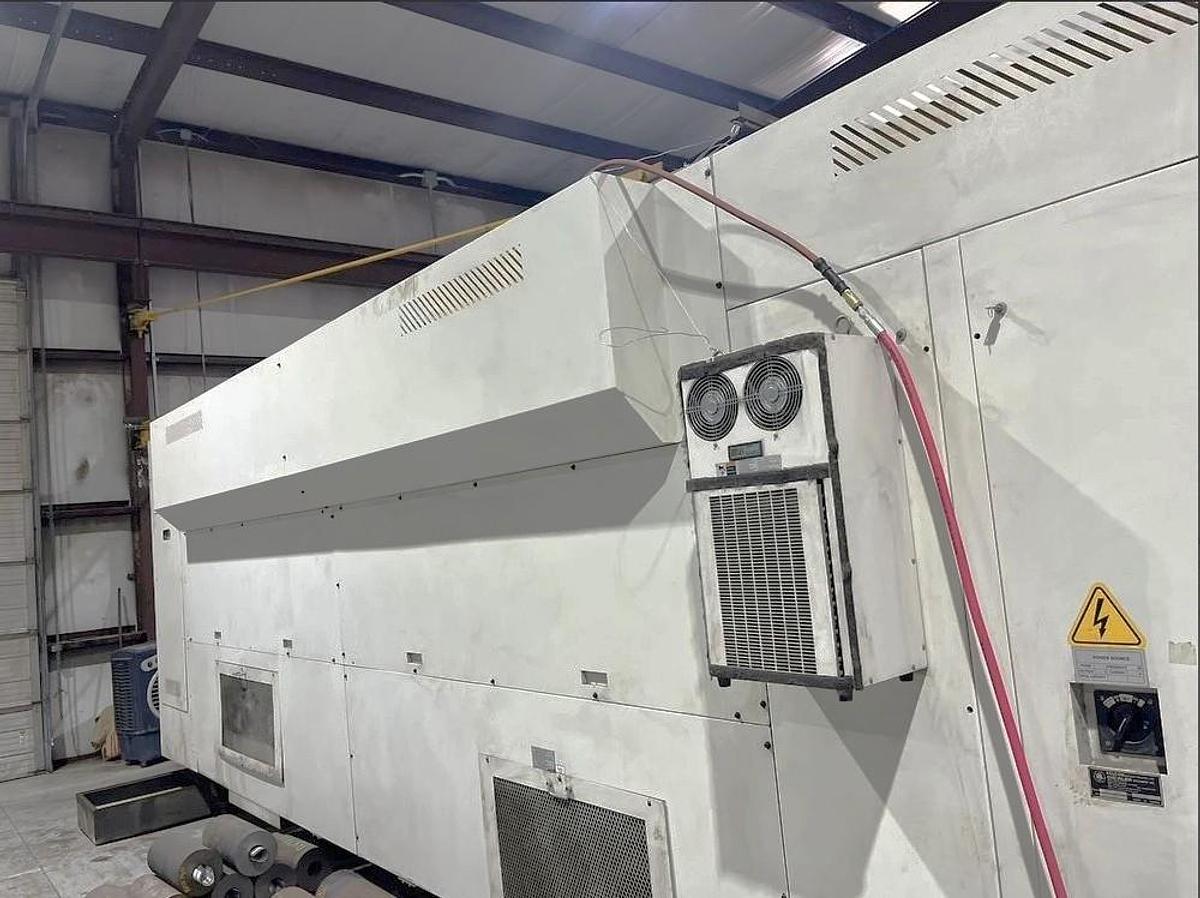 Used 2012 Chevalier FBL-530C with 12.59" Bore, 32" 4 Jaw Manual Front Chk, 28" Rear Air Chk, Tailstock, 118" cc, 500 RPM, Conveyor 