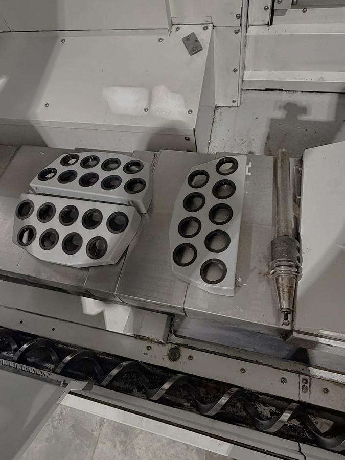 Used 2009 Haas ES-5-4T with HRT 4th Axis Rotary Table, Tool Probing, Remote Jog Handle, Chip Auger