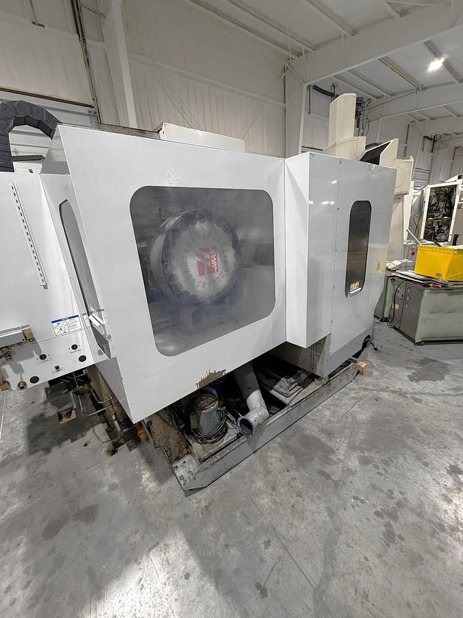 Used 2009 Haas ES-5-4T with HRT 4th Axis Rotary Table, Tool Probing, Remote Jog Handle, Chip Auger