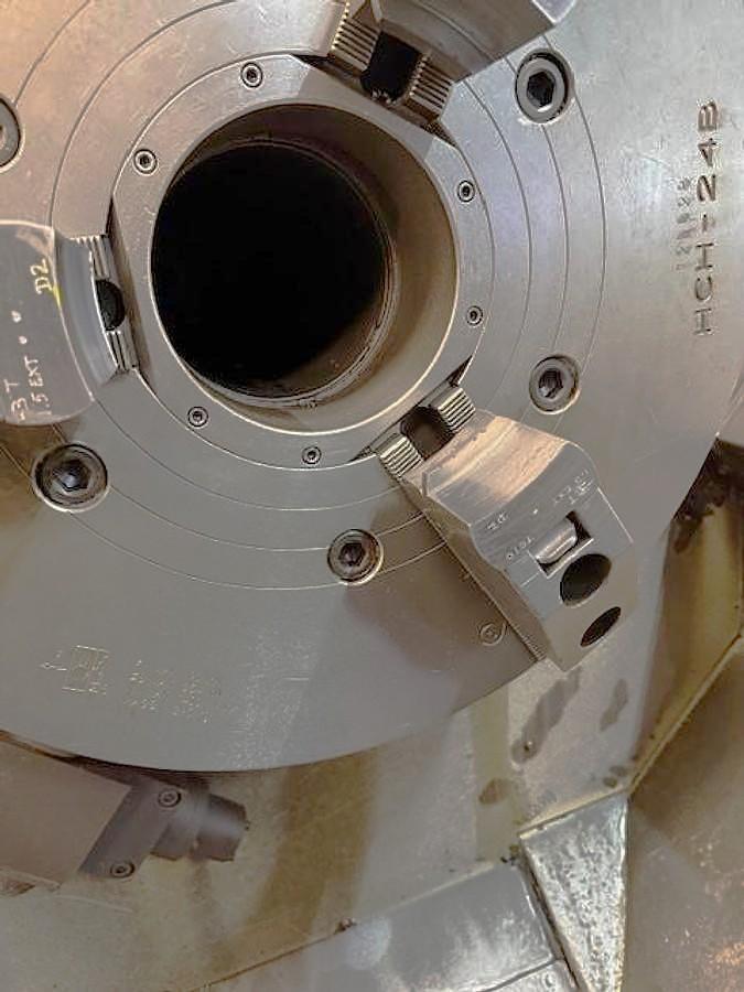 Used 2012 Doosan Puma 700L with 24" Hyd. Chk, 6.5" Bar Cap., 126" Turn Length, SMW Steady Rest, Tailstock, Conveyor, Tool Eye