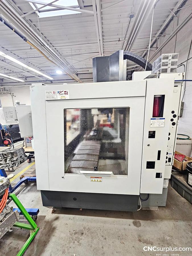 Used 2011 Haas VF4D with Progr. Coolant, Chip Auger, Direct Drive, 8100 RPM, CAT 40, USB Port, From a Tech School - ONLY 1942 Power On Hours
