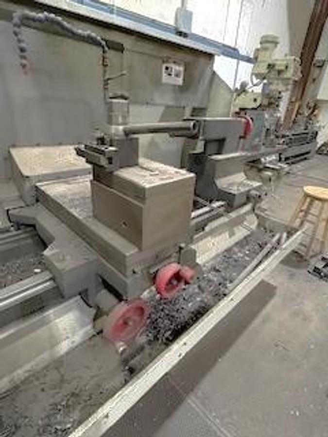 Used 2014 Haas TL-3B Big Bore with 8.5" Bar Capacity, (2) 24" Manual Chucks, Aloris Tool Post, Hand Wheels