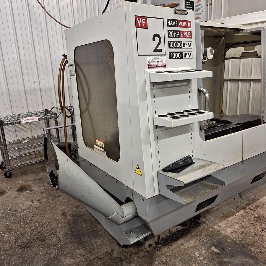 Used 2007 Haas VF-2B with 10,000 RPM, Haas HRT-210 Rotary Table, 2 Speed Gearbox, Pcool, Auger
