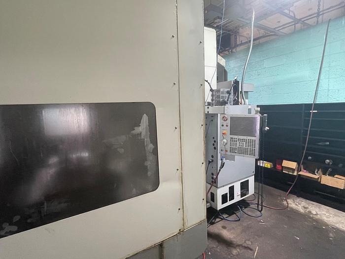 Used 2010 Haas EC-1600YZT with Extended Y and Z Travel, Built in 4th Axis Table