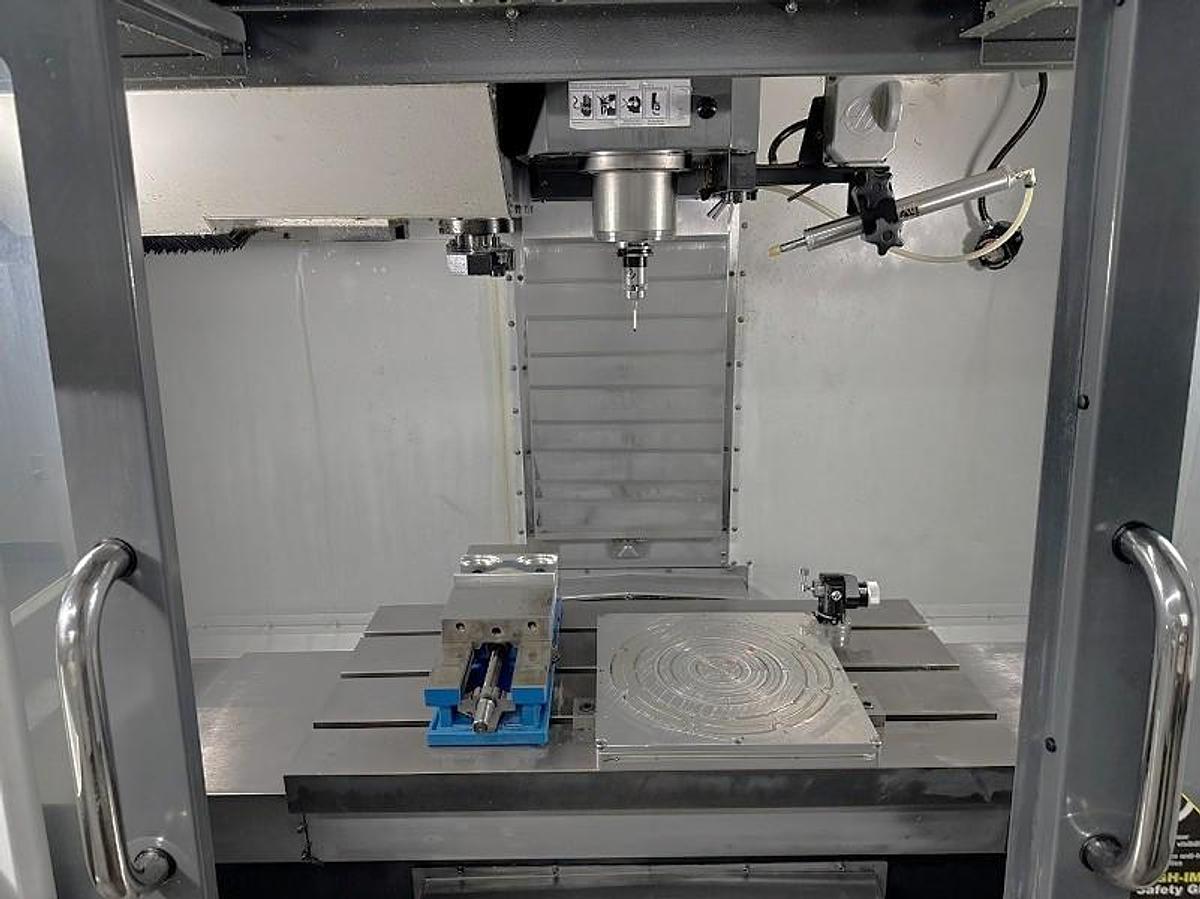 Used 2012 Haas VF-2SSYT with 24 Pos. Side Mount ATC, 12k RPM, Haas Probing, Auger, PCool, Auto Air Gun