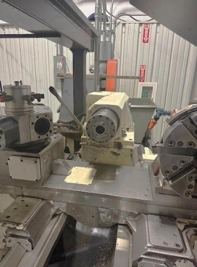 Used 2007 Mazak Powermaster 3000U  w/ 10.2" Bore, (2) 18" 4 Jaw Manual Chucks, Chip Conveyor, Tailstock