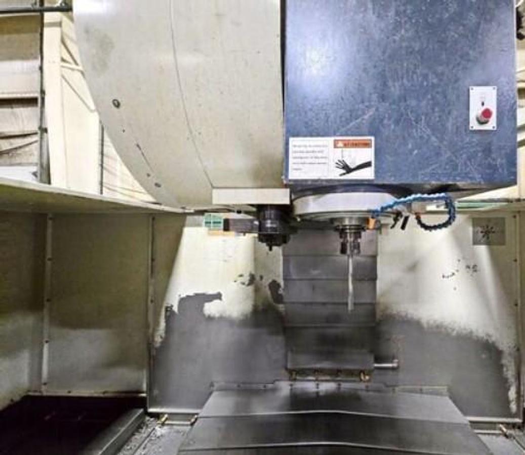 Used 2004 Takumi V-22 with Coolant Thru Spindle, Conveyor, 24 Pos. Side Mount ATC, RJH, Boxed Ways, Fanuc Control