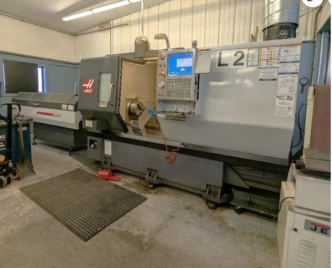Used 2011 Haas ST-30M Chucker with Haas Barfeed, Chip Conveyor, Parts Catcher, Live Tooling, 3" Bar Cap., 10" Chuck, (5) Live Holders