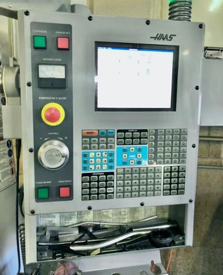 Used 2004 Haas VF2D with 4th Axis Drive, 24 Station Side Mount ATC, Chip uger, Programmable Coolant