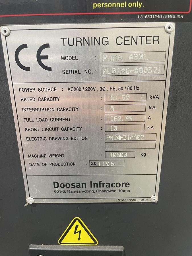 Used 2011 Doosan Puma 480L with 10.8" Bar Cap., (2) 24" Manual Chks, 80" cc, S/R, Tailstock