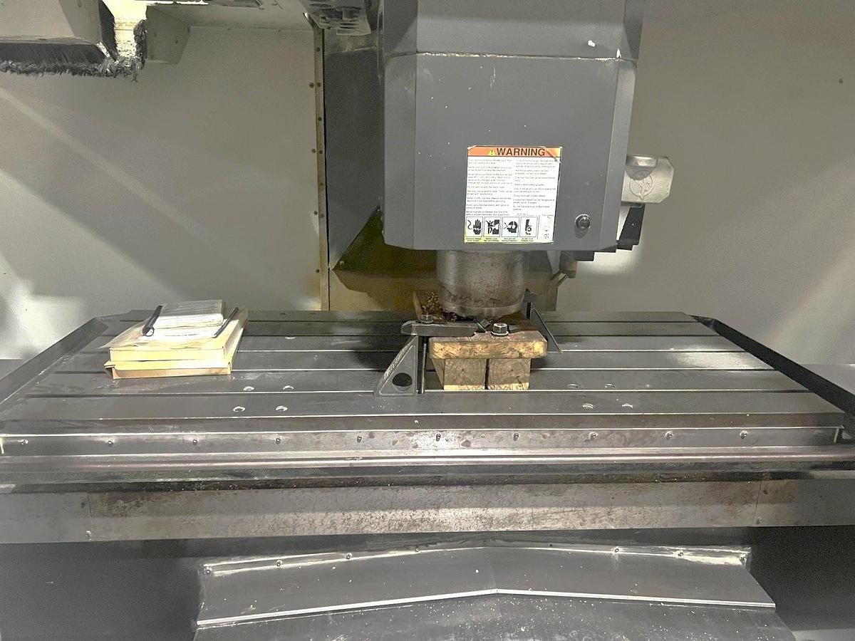 Used 2011 Haas VF-6/50 with CAT 50 Taper Spindle, Programmable Coolant Nozzle, Chip Auger, 2 Speed Gearbox
