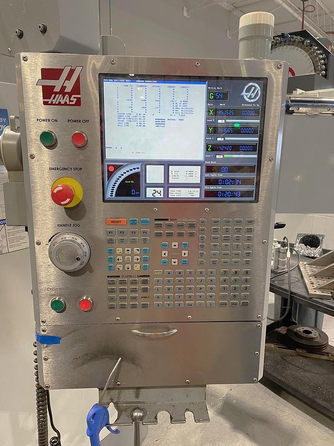 Used 2007 Haas VF4B with 4th Axis Drive, 24 Pos. Side Mounted ATC, 10,000 RPM, 2 Spd Gearbox, Pcool, Chip Auger, Nice Shape