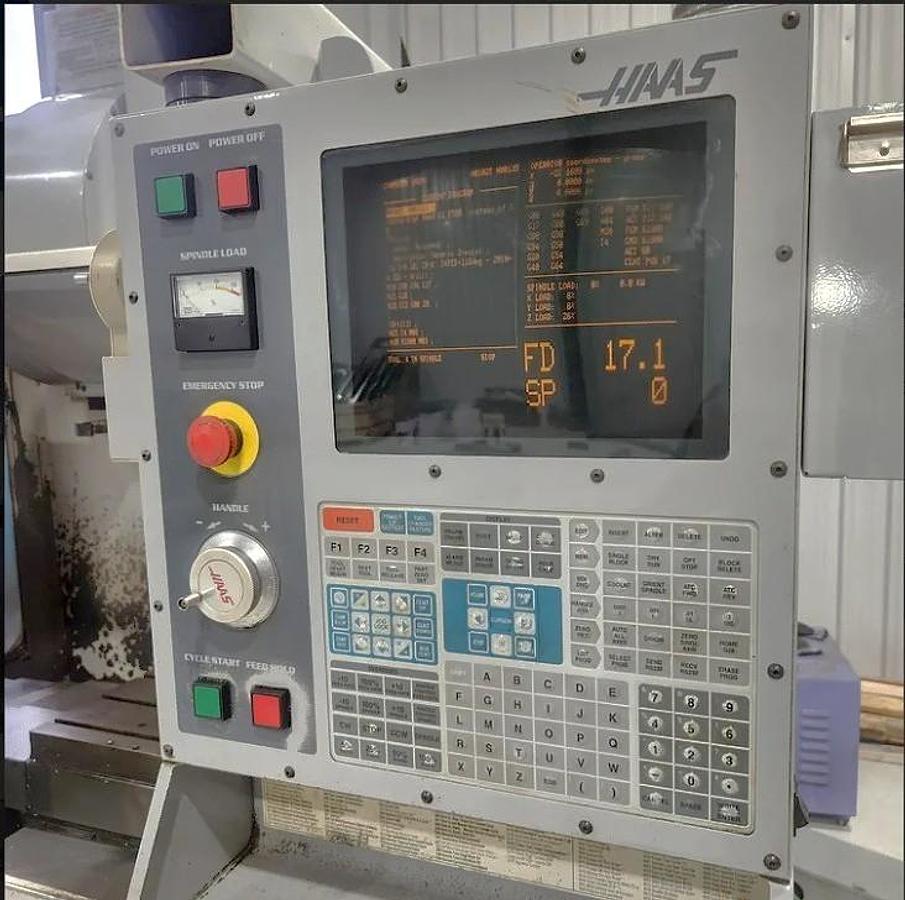 Used 2001 Haas VF2 with 4th Axis Drive, Programmable Coolant, Chip Auger, USB Emulator, Rigid Tapping, 24 Station Side Mounted ATC
