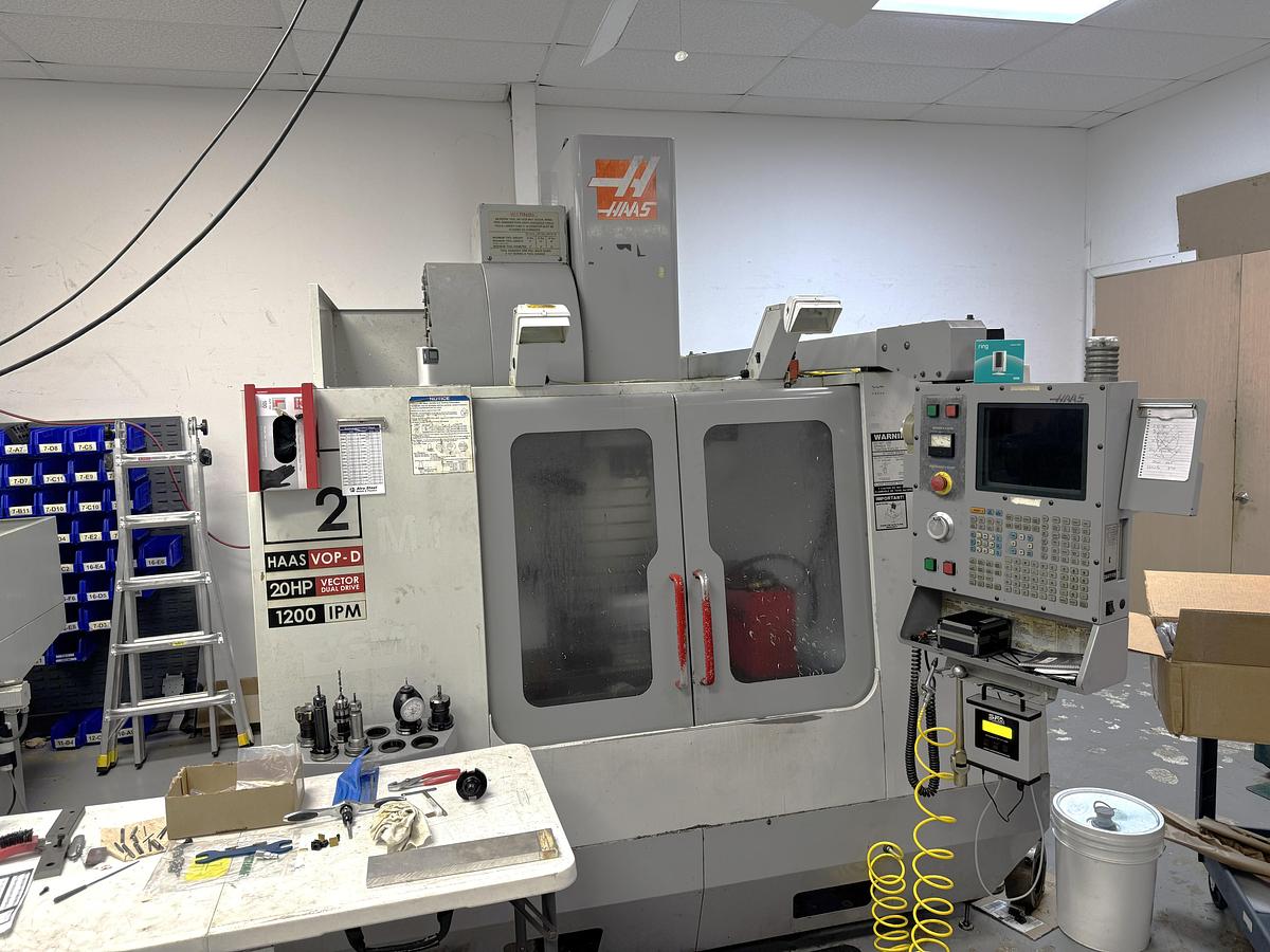 Used 2002 Haas VF2D with Haas Rotary Table, 24 Station Side Mount ATC, Chip Auger, Programmable Coolant