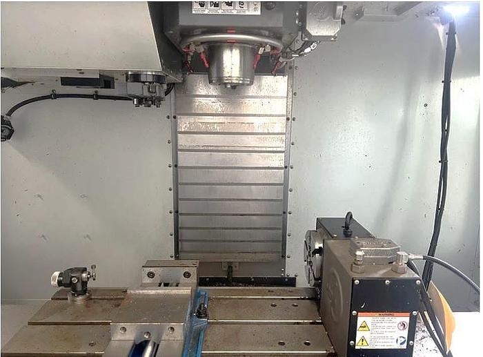 Used 2015 Haas VF2 with 24 Station Side Mount ATC, Probing, 4th Axis Drive/Wiring, Haas 4th Axis Rotary Table, PCool, Chip Auger