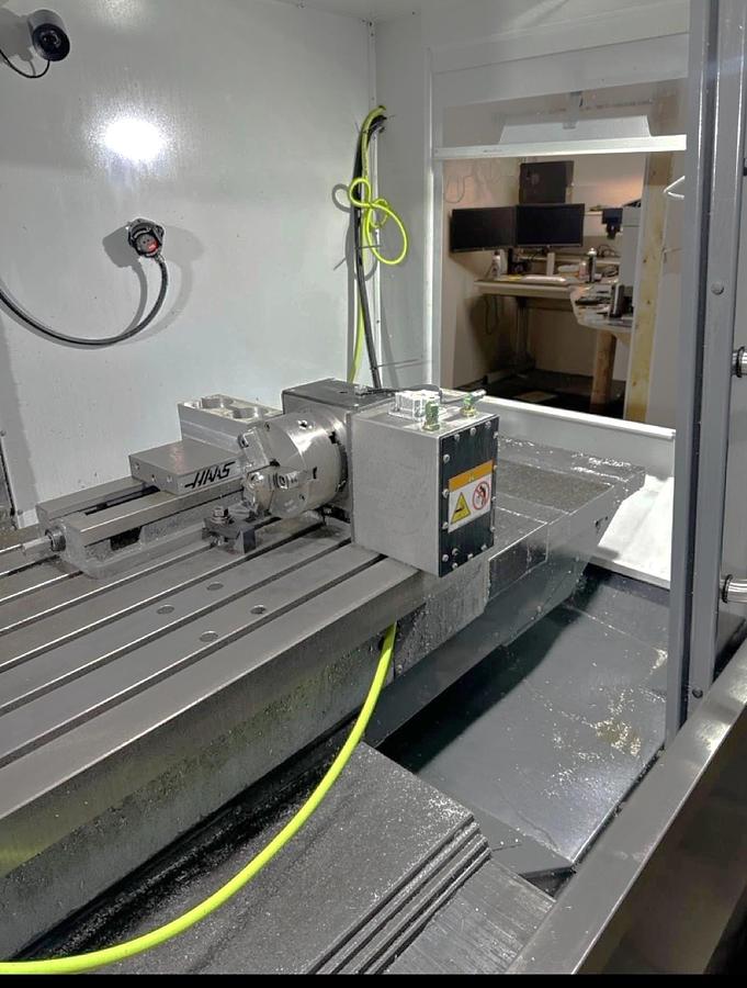 Used 2021 Haas VF-5SS with Haas HRT-160 4th Axis Table, Probing, PCool, Auger, 4th & 5th Axis Drives, Mist Collector, Tooling