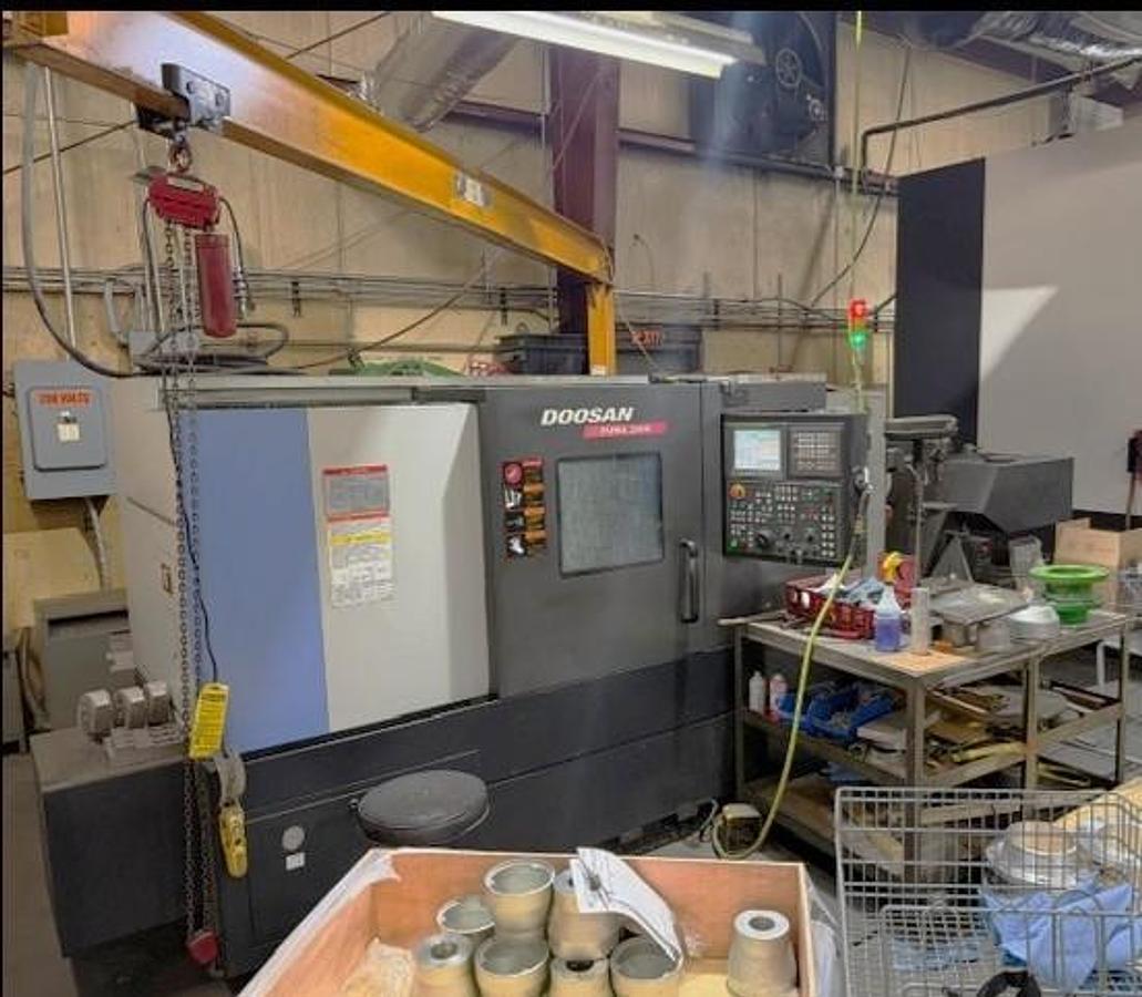 Used 2011 Doosan Puma 2600 with 10" Chuck, Tailstock, Tool Presetter, Chip Conveyor, Fanuc 0i Control