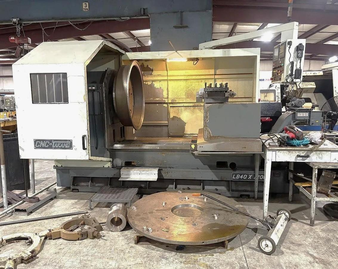 Used 2013 Takang LB40 x 1200 CNC Heavy Duty Lathe with 60" sw, 39.3" Max Cut Diam., 600 RPM, 6" Bore, 36" Chuck, 4 Pos. Trt., Fanuc