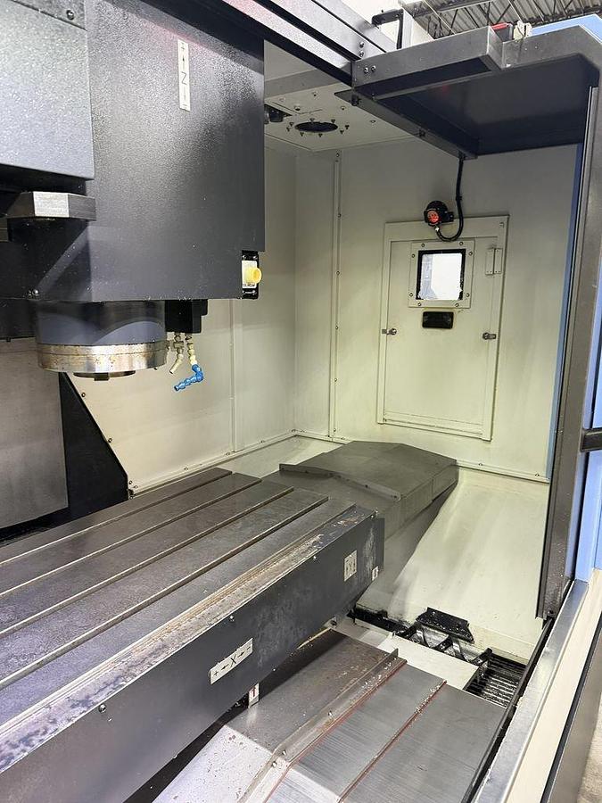 Used 2022 DN Solutions Mynx 5400/50 II with 4th Axis Drive, CAT50 Big Plus Spindle, Chip Conveyor, Mist Collector, Conversational