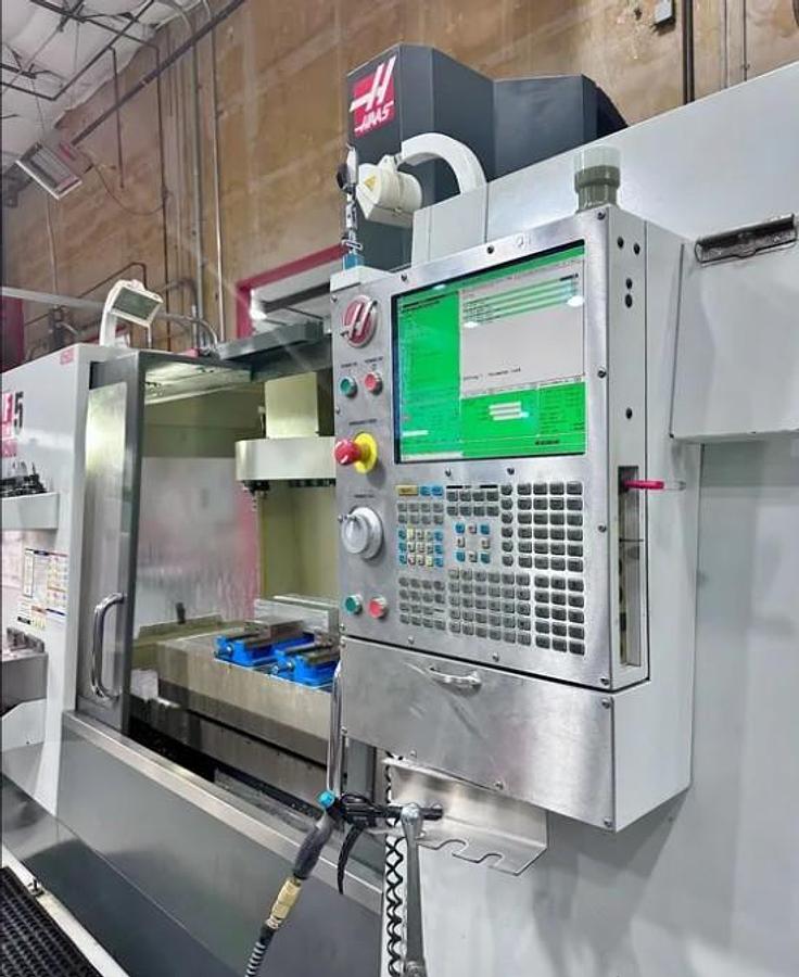 Used 2011 Haas VF5/40 w/ Haas HRT310 Rotary Table, 10,000 RPM, PCool, HSM, Auger