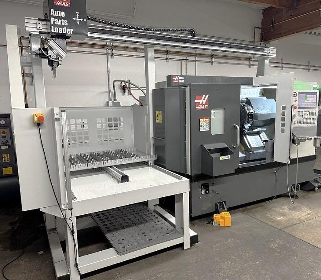 Used 2022 Haas ST-25Y Chucker (no tailstock) with 10" Chuck, 3" Bar Capacity, Milling, Y Axis, Conveyor, Auto Parts Loader System