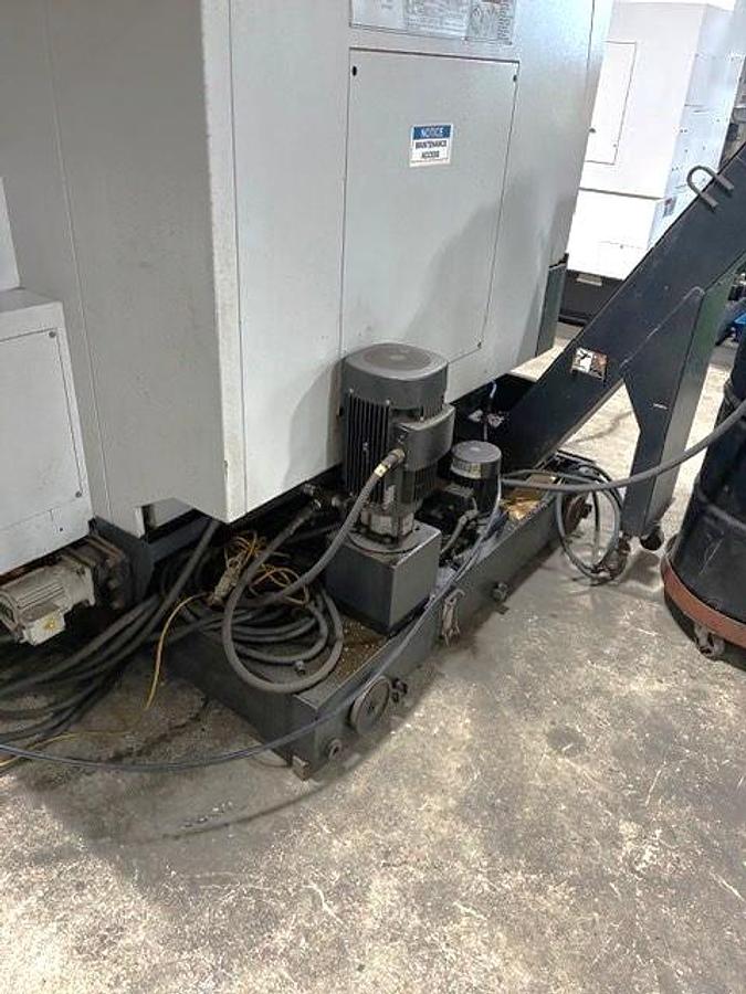 Used 2009 Mazak Nexus VCN 510C/40 II with Chip Conveyor, 48 Station Side Mounted ATC, CAT 40, 12,000 RPM, ONLY 2,201 CUT HOURS!!