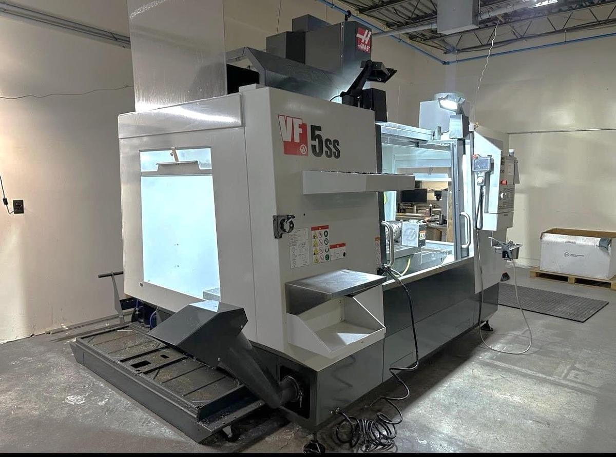 Used 2021 Haas VF-5SS with Haas HRT-160 4th Axis Table, Probing, PCool, Auger, 4th & 5th Axis Drives, Mist Collector, Tooling