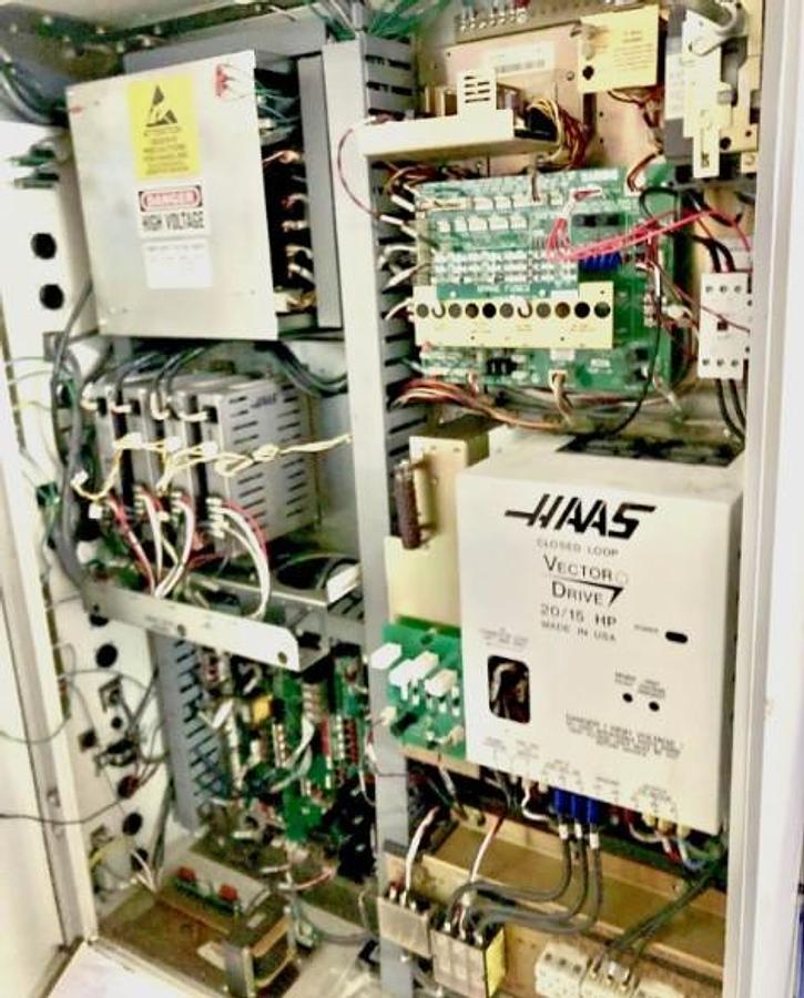 Used 2005 Haas VF2D with 4th Axis Drive, 24 Station Side Mount ATC, Chip uger, Programmable Coolant