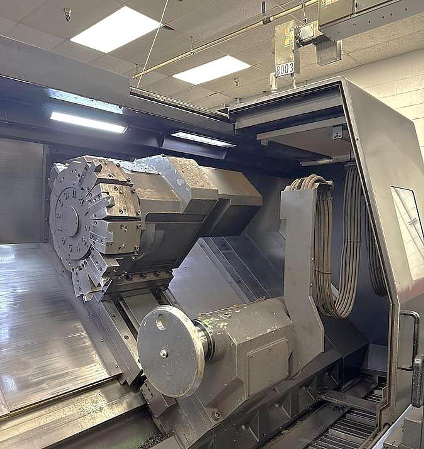 Used 2015 Doosan Puma 800LM with C Axis & Milling, 31.5" 3 Jaw Rohn Air Chk, 12.6" Bar Cap., 126" Turn Length, New RIP Steady Rest, Tailstock, Conveyor
