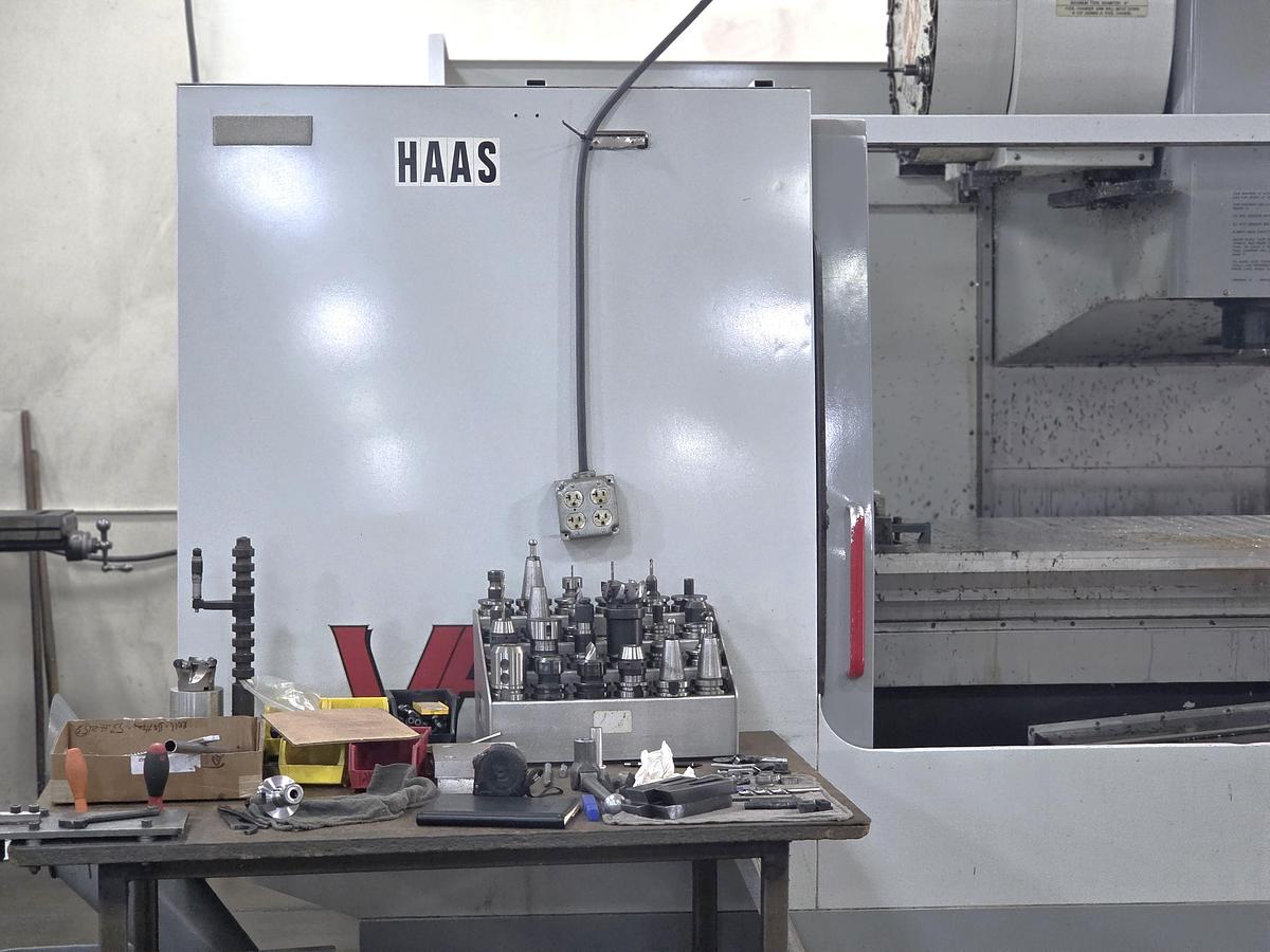 Used 2000 Haas VF-9/40 with 10,000 RPM, Chip Auger, Prog. Coolant, Remote Jog Handle, 40 Pos. Side Mount ATC, 4th Axis Drive