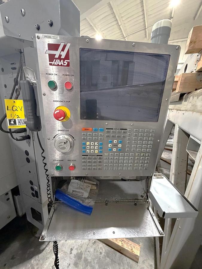 Used 2009 Haas ES-5-4T with HRT 4th Axis Rotary Table, Tool Probing, Remote Jog Handle, Chip Auger