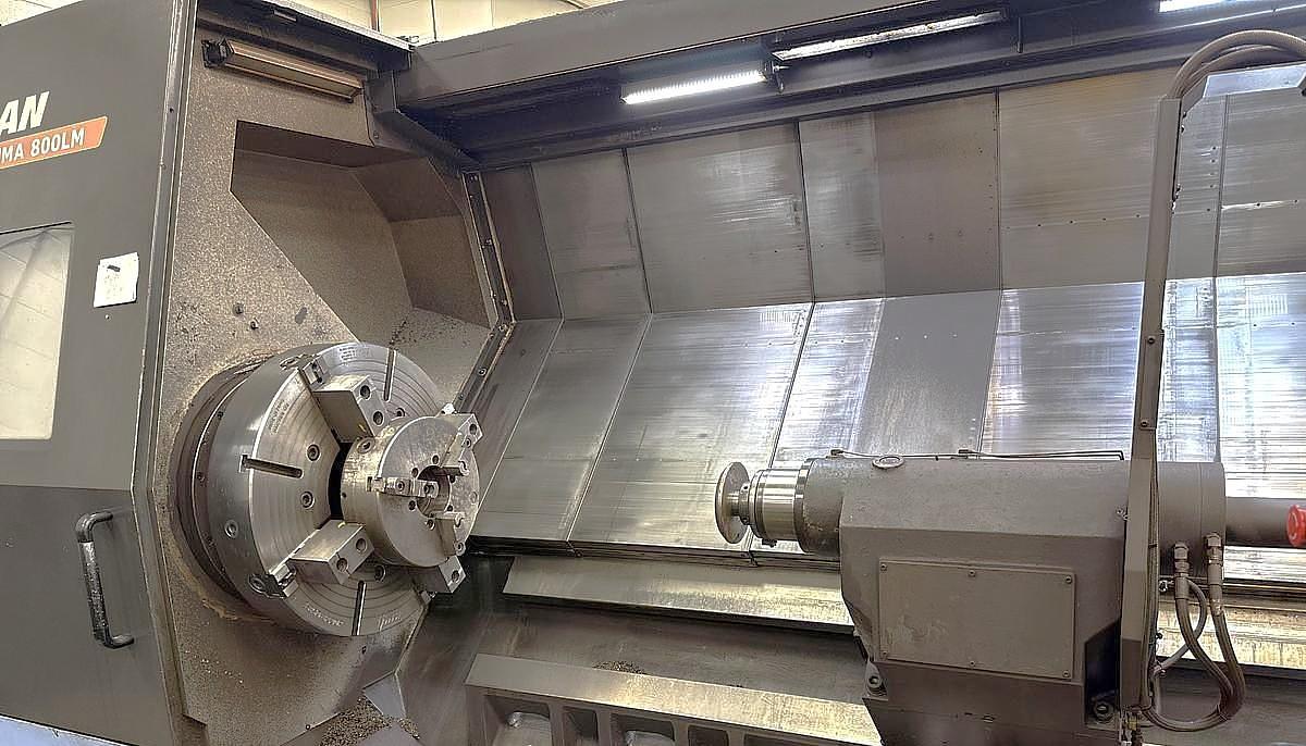 Used 2015 Doosan Puma 800LM with C Axis & Milling, 32" 4 Jaw Manual Chk, 12.6" Bar Cap., 126" Turn Length, New RIP Steady Rest, Tailstock, Conveyor