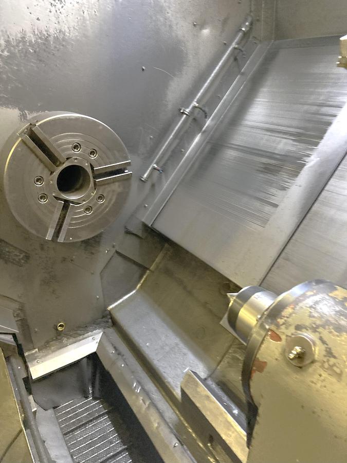 Used 2006 Leadwell LTC50-BL with 18" Hyd Chk, 4.6" Bar Cap., 33.5" sw, 80" cc, 1500 RPM, 50 HP, Steady Rest, Conveyor, Fanuc 0i-TC