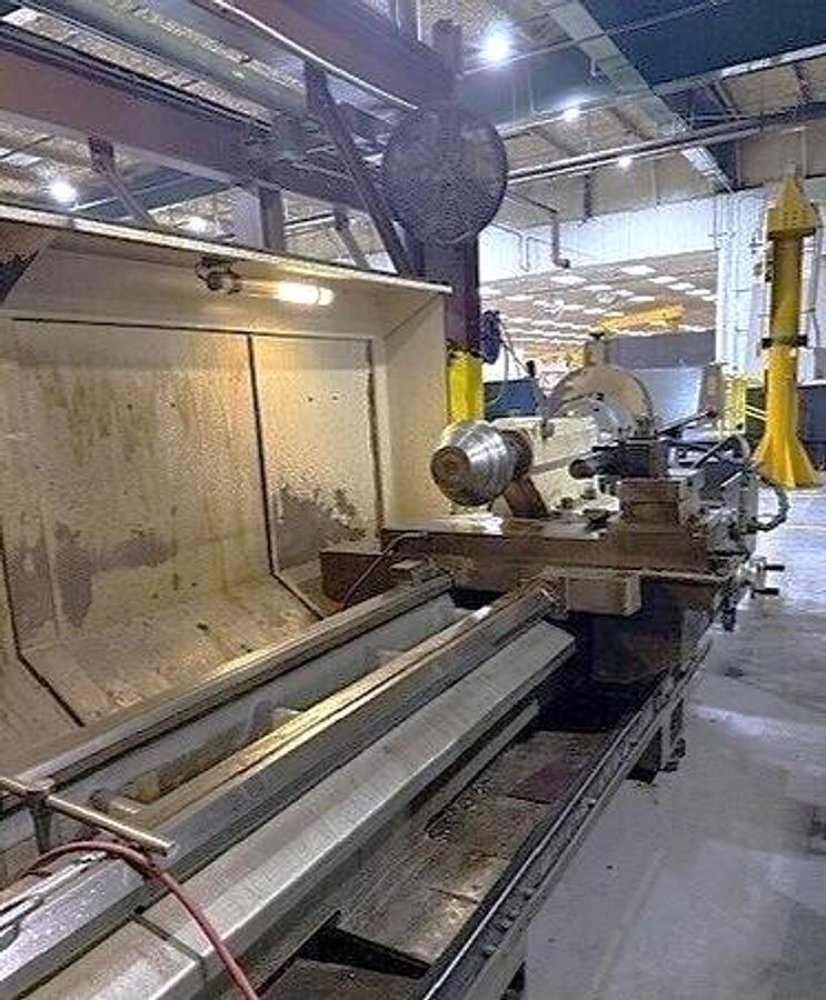 Used 2008 Weiler E90/3000 with 14" Bar Capacity, (2) 31" 4 Jaw Chucks, 120" cc, Chip Conveyor, Tailstock, Steady Rest, Weiler Control