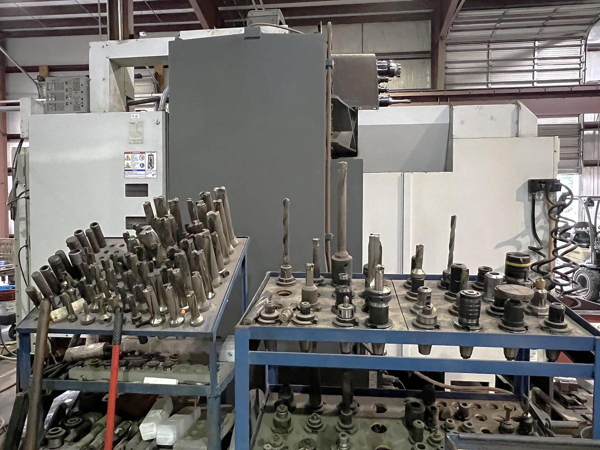 Used 2012 Haas VF8/50 with Coolant Thru Spindle, Probe Ready, 4th Axis Table, CAT 50, 7500 RPM, 30 Station Tool Changer, 