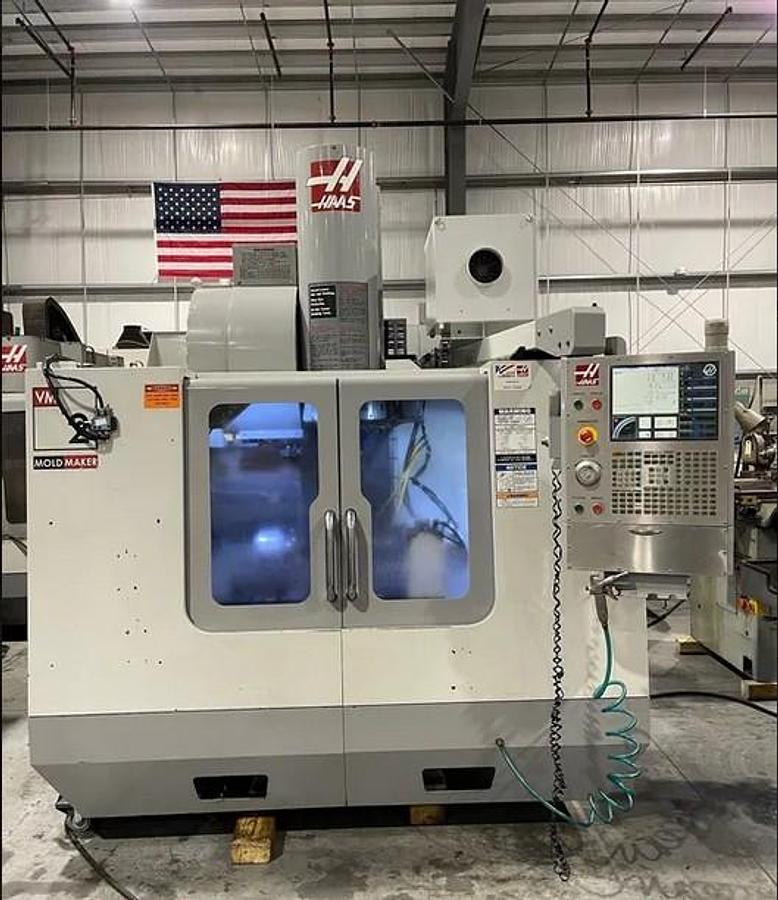Used 2006 Haas VM-2 with Haas HRT210 4th Axis Table, Prog. Coolant, Remote Jog Handle, 24 Station Side Mount ATC, High Spd Machining